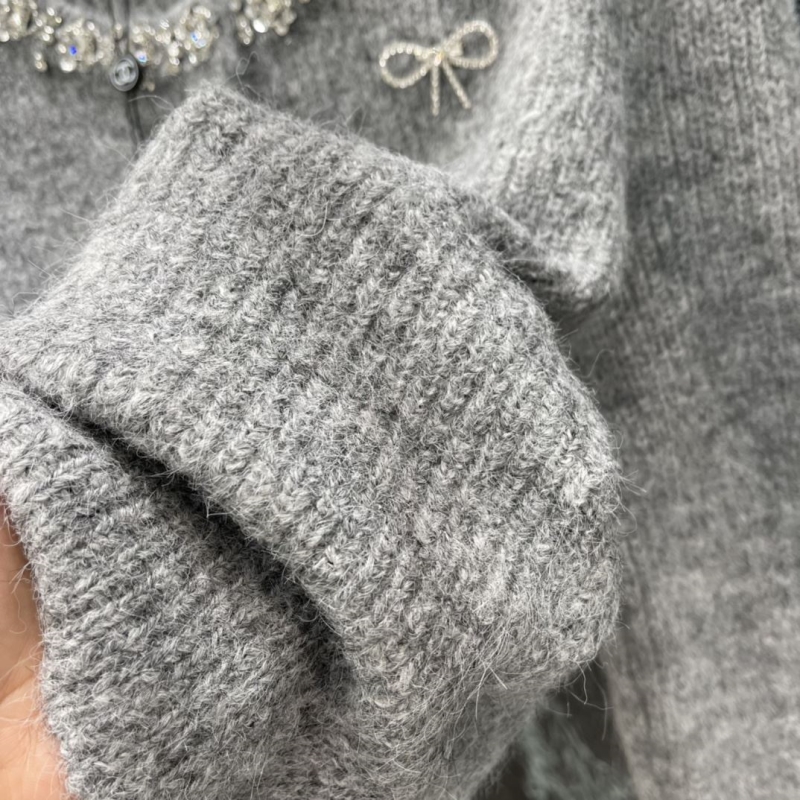 Ch**el sweaters